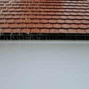 Roof flashing at chimney transition -- Green Door Home Inspections