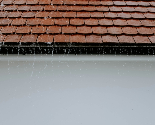Roof flashing at chimney transition -- Green Door Home Inspections