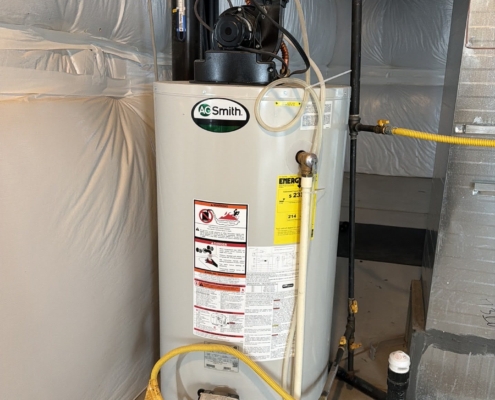 Water heater with TPR valve and discharge pipe — Green Door Home Inspections